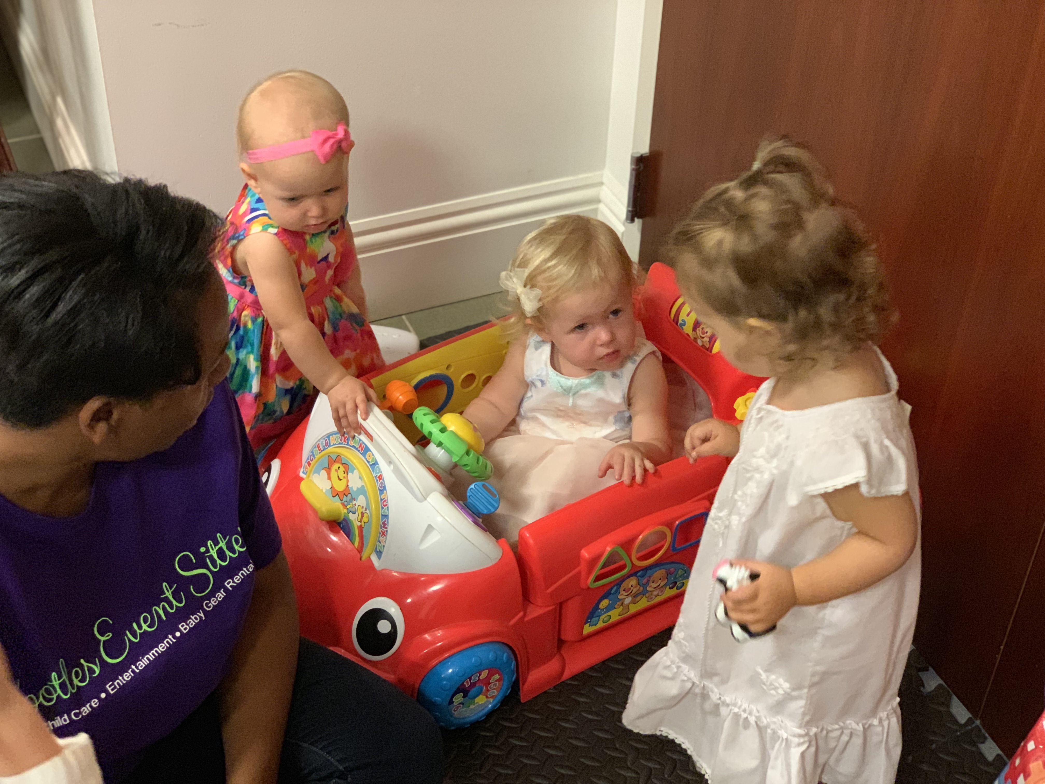 Tyneshia playing with the toddlers during a wedding at The Ballroom on Church Street - Orlando.